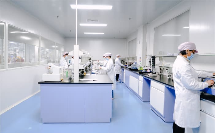 Quality-control laboratory with technicians and testing benches, published by Xuelei
