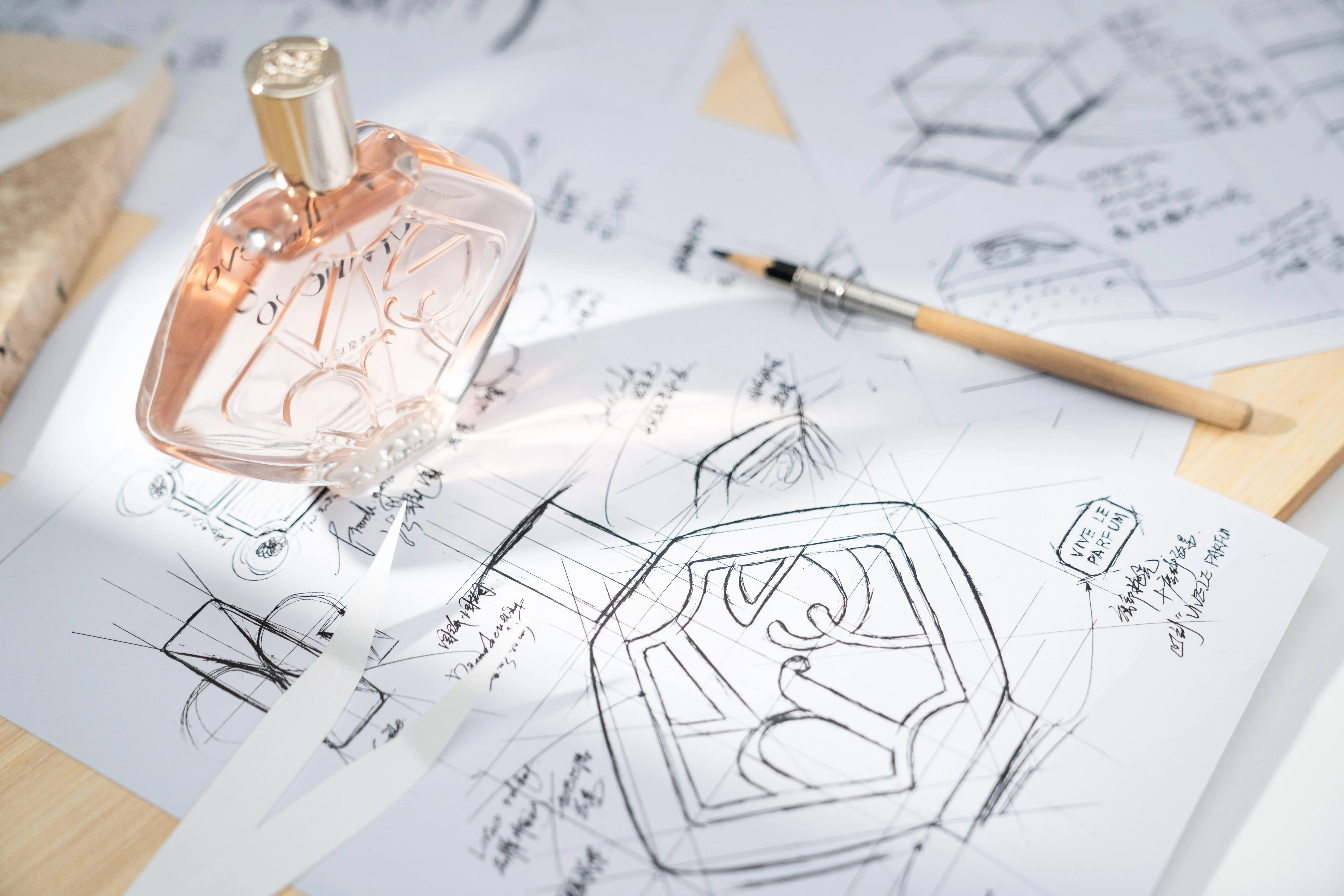 Editorial illustration of a clear perfume bottle with pale gold liquid and a transparent cap